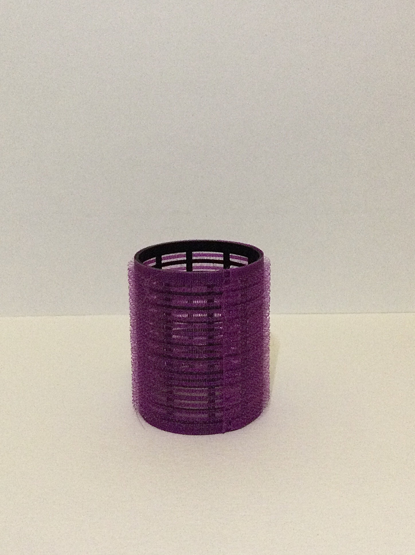 Photograph of a hair roller, angle 2